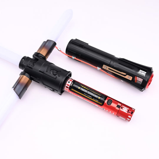 Disassembled Kylo Saber hilt showing the internal battery and electronics chassis