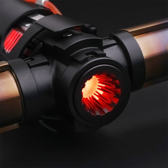 Close-up of the Kylo Saber red illuminated central emitter and side emitters